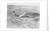 Airplane Flying Over Landscape by Anonymous