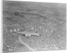 Airplane Flying Over Los Angeles by Anonymous