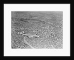 Airplane Flying Over Los Angeles by Anonymous