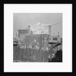 Modern Apartment Building Behind Slum Tenement in Chicago by Anonymous