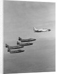 The Lockheed T2V-1 SeaStar Teaming up with the Blue Angels Stunt Team by Anonymous