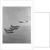 The Lockheed T2V-1 SeaStar Teaming up with the Blue Angels Stunt Team by Anonymous