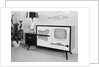 Early Model Radio Television in Home by Anonymous