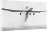 Crop Dusting Airplane in Flight by Anonymous