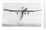 Crop Dusting Airplane in Flight by Anonymous