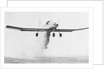 Crop Dusting Airplane in Flight by Anonymous