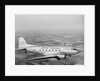 Douglas DC-3 Plane in Flight by Anonymous