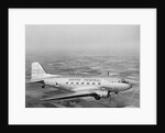 Douglas DC-3 Plane in Flight by Anonymous