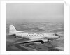 Douglas DC-3 Plane in Flight by Anonymous