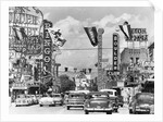 Various Casino Signs Along Las Vegas Street by Anonymous