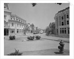 Workers Driving in Mock Town by Anonymous