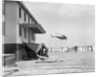 Helicopter Flying Over Storm Ridden Area by Anonymous