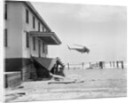 Helicopter Flying Over Storm Ridden Area by Anonymous