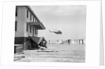 Helicopter Flying Over Storm Ridden Area by Anonymous