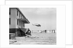 Helicopter Flying Over Storm Ridden Area by Anonymous