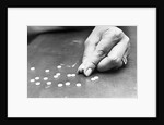 Hand Holding Pills Containing Thalidomide by Anonymous