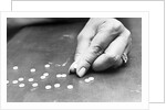 Hand Holding Pills Containing Thalidomide by Anonymous