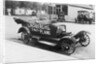 Early Model Car Parked at Station by Anonymous
