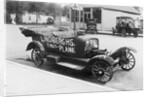 Early Model Car Parked at Station by Anonymous