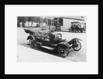 Early Model Car Parked at Station by Anonymous
