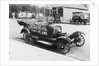 Early Model Car Parked at Station by Anonymous