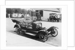 Early Model Car Parked at Station by Anonymous
