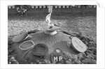 Military Caps Showing Tribute at JFK's Grave by Anonymous