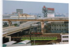 View of Downtown Tokyo with Railroad Yard in Foreground by Anonymous