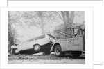 Tow Truck Towing Station Wagon by Anonymous