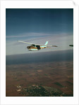 Cessna 210 Centurion Flying by Anonymous