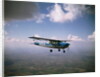 Cessna 182 Flying by Anonymous