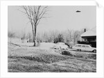 Unidentified Flying Object Flying Over House by Anonymous