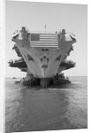 Tugboats Pushing the Aircraft Carrier John F. Kennedy by Corbis