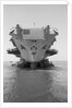 Tugboats Pushing the Aircraft Carrier John F. Kennedy by Corbis