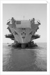 Tugboats Pushing the Aircraft Carrier John F. Kennedy by Corbis