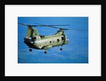 Military Helicopter Flying in Blue Skies by Anonymous