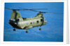 Military Helicopter Flying in Blue Skies by Anonymous