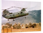 CH-46 Helicopter Picking up Supplies by Anonymous