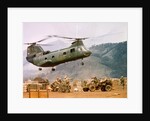 CH-46 Helicopter Picking up Supplies by Anonymous