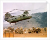CH-46 Helicopter Picking up Supplies by Anonymous