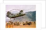 CH-46 Helicopter Picking up Supplies by Anonymous