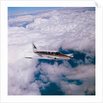 Navajo Piper Plane Flying by Anonymous