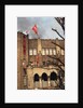 Student Waving Flag from Top of Building by Anonymous