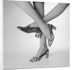 View of Women's Feet Wearing High Heeled Shoes by Anonymous