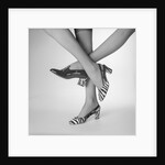 View of Women's Feet Wearing High Heeled Shoes by Anonymous