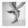 View of Women's Feet Wearing High Heeled Shoes by Anonymous
