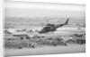 Helicopter Flying over Land Site by Anonymous