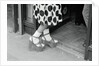 Woman Wearing High Platform Shoes by Anonymous