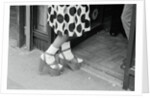 Woman Wearing High Platform Shoes by Anonymous