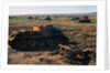 A Field of Wrecked Tanks by Anonymous